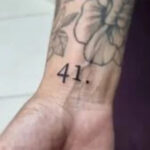 Cultural interpretations and symbolic meanings of the 41 tattoo.