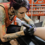 Hand-tapped tattoo featuring intricate line work and shading, showcasing the artistry of Tebori.