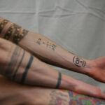 Mathematical equations and theories on a professor's arm