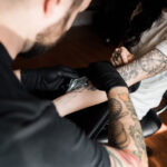 Fresh Tattoo Covered with Bandage