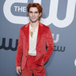 KJ Apa's tattoo collection showcases his heritage, musical tastes, and personal values
