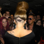 Lady Gaga's rose tattoo with "La Vie En Rose" lyrics, a tribute to her role in "A Star Is Born."