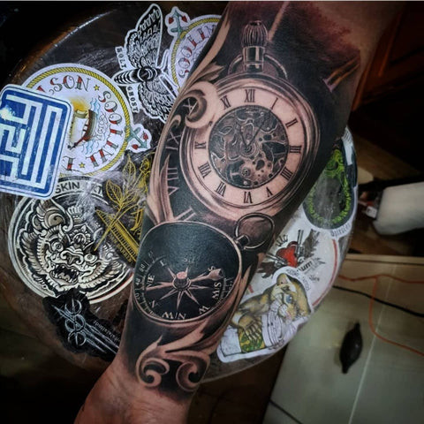 Compass and clock tattoo