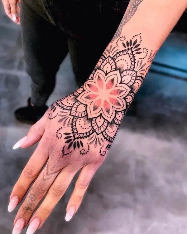 Intricate mandala bracelet and hand tattoo design by @norinatattoo