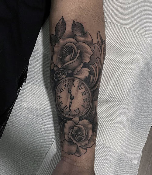 Meaningful Flower and Watch Tattoo