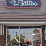 Melissa in front of our tattoo parlor