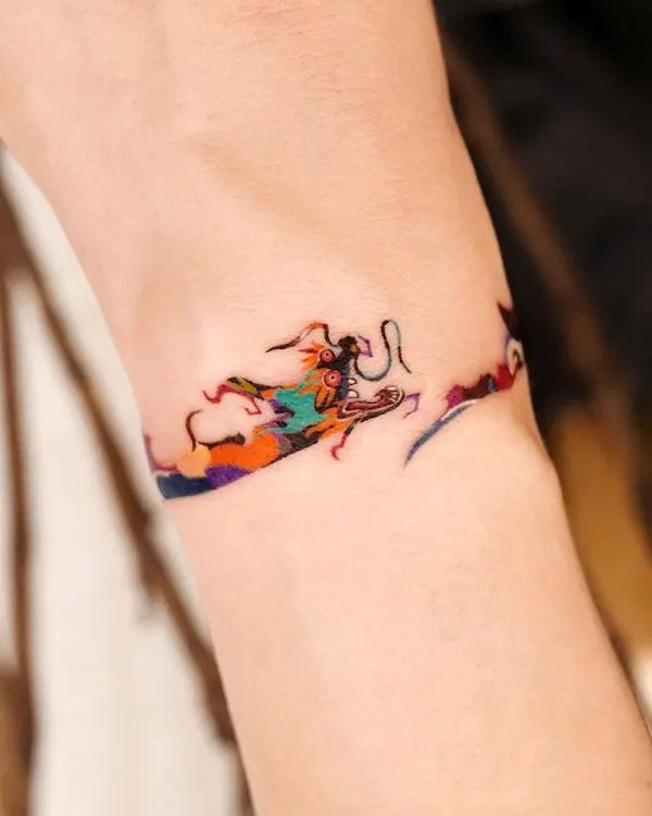 Colorful oriental dragon bracelet tattoo design by @tattooist_eq