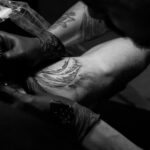 Tattoo artist at work