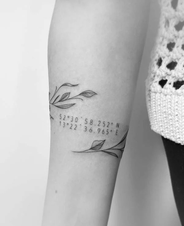 Plant bracelet and coordinates tattoo of a special place by @alejandra.heartist