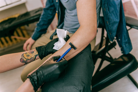 Preparing the skin for a tattoo