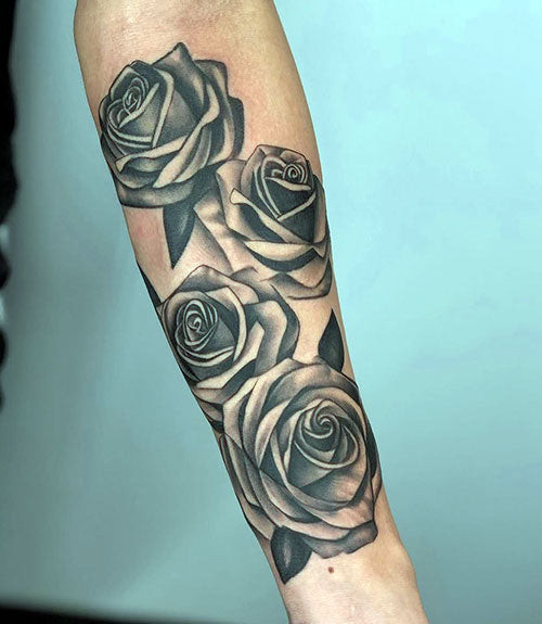 Refined Four Roses Tattoo on Arm For Guys