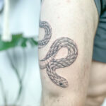 Thigh tattoo