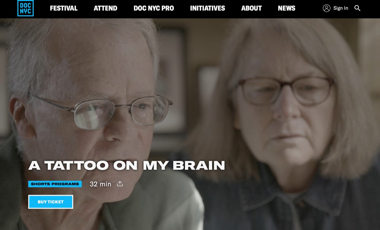 Neurologist being filmed during the creation of the 'A Tattoo on My Brain' documentary, showcasing behind-the-scenes insights