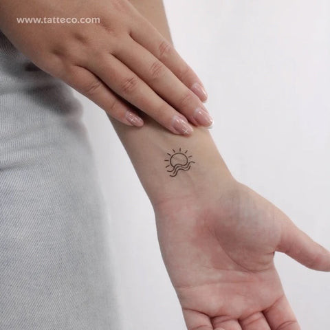 Semi permanent tattoo of sun and waves