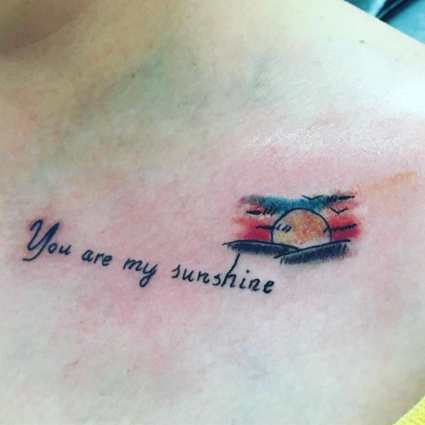 Small sun you are my sunshine clavicle tattoo