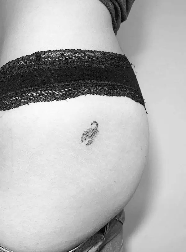 Small Scorpio constellation tattoo on the thigh, by @line.art_.tattoo, representing mystery and passion