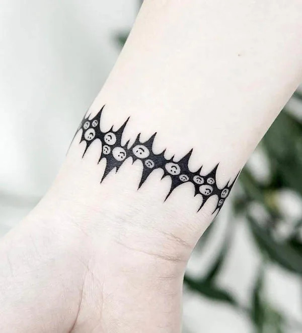 Humorous smiley face bracelet tattoo design by @lana_here_tattoo