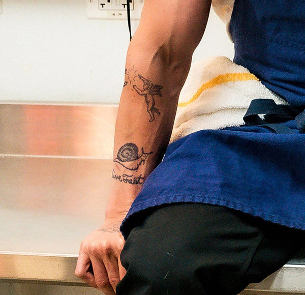 Carmy's snail tattoo, reflecting his life's ironies