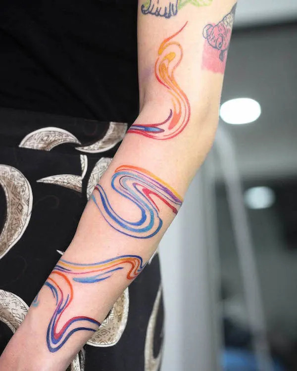 Bold swirls arm tattoo design by @aink_tattoo