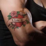 Woman's Should With Colorful Tattoo