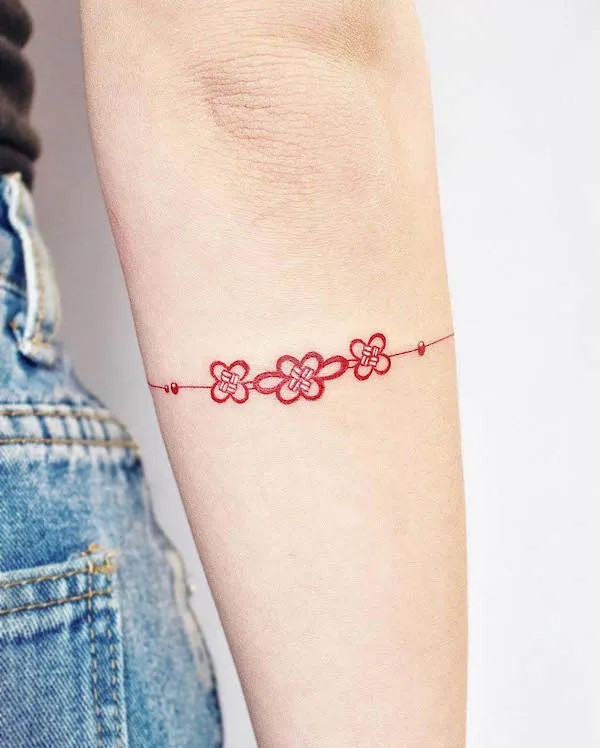 Authentic traditional knot Norigae tattoo design by @tattooist_arun