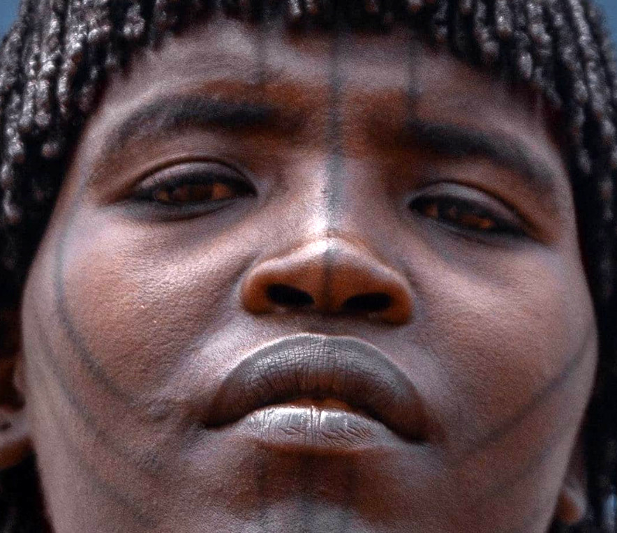 Close-up of Tsemay tattooing