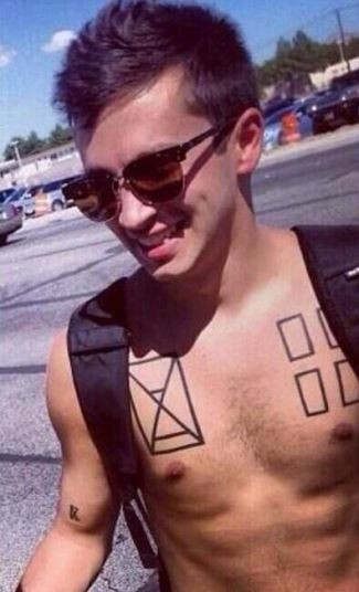Tyler Joseph's X tattoo, symbolizing his connection with hometown fans