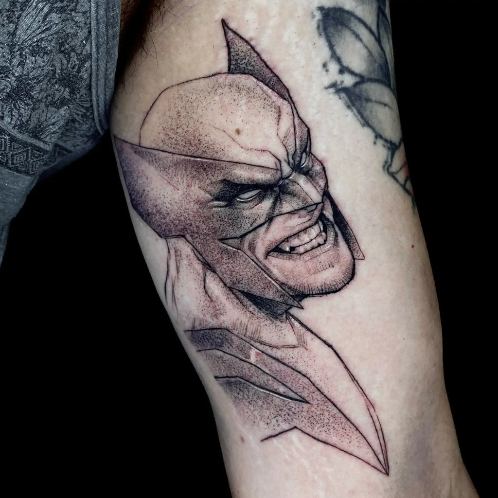 Wolverine tattoo featuring a comic panel created by Tcm.arte on Instagram.